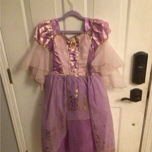 Disney Rapunzel costume size 7/8 for children with wig.